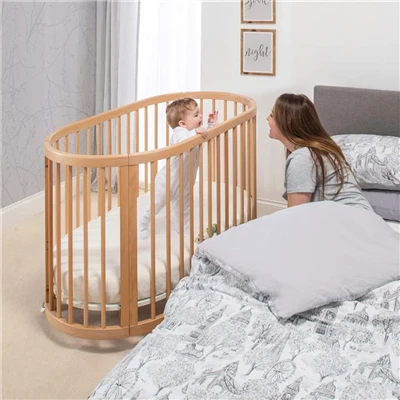 Dětská postýlka oválná